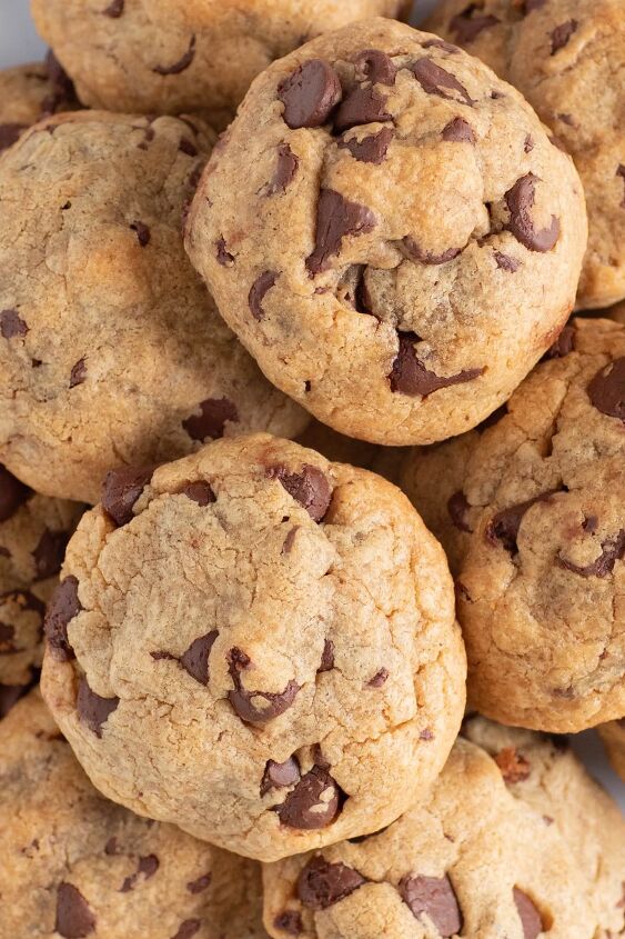 this 4 ingredient chocolate chip peanut butter cookie will be your fav, up close chocolate chip cookies on a plate