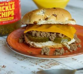 dutch oven crumbly burger maid rite style loose meat sandwich, Dutch oven Iowa Style Maid Rite Loose Meat Sandwich topped with cheese and pickles