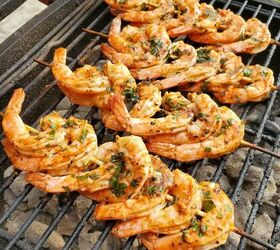 greek grilled shrimp with basil orange orzo, Shrimp skewers on a grill