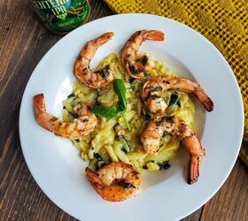 greek grilled shrimp with basil orange orzo, Plate of grilled shrimp over cheesy parmesan Orzo with basil and pine nuts