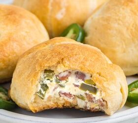 jalapeno popper rolls using crescent rolls, up close view of jalapeno popper roll on a plate