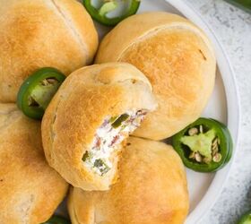 jalapeno popper rolls using crescent rolls, plate of jalapeno popper stuffed rolls with sliced jalapenos