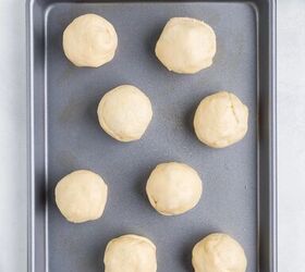 jalapeno popper rolls using crescent rolls, filled jalapeno rolls on a baking sheet