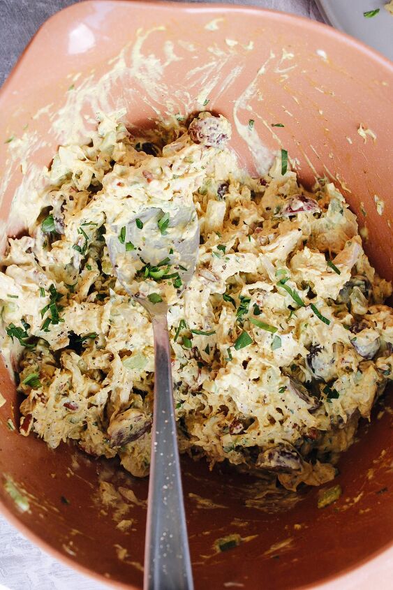 curry chicken salad with grapes, curry chicken salad with grapes in a mixing bowl
