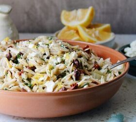 curry chicken salad with grapes, lemon orzo pasta salad in a red bowl