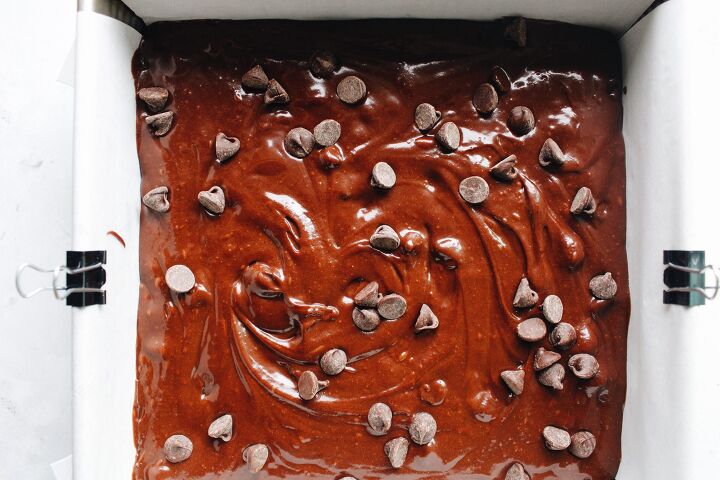 honey brownies, brownie batter spread in 8x8 metal baking dish