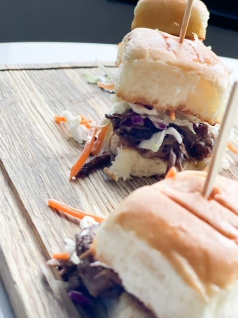 best recipe for braised korean beef short ribs on a slider, Braised Korean Beef Short Ribs On A Slider on a wooden board