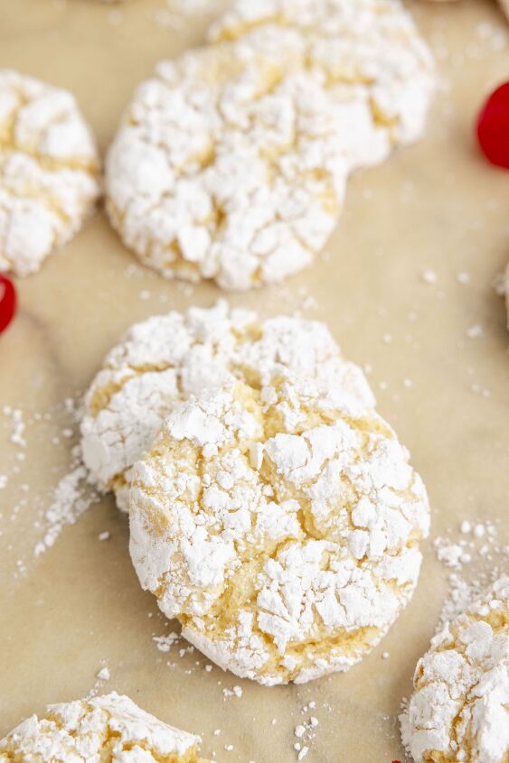 need a vacation try these pineapple cake mix cookies now, up close view of crinkle cookies on parchment paper