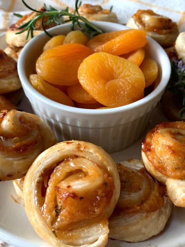 easy crock pot pork chops and gravy, Apriccot puff pastries on a white plate and apricots in a white bowl