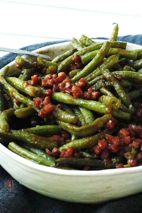 barbequed green beans with ham, A white bowl of barbecued green beans with diced hams and onions
