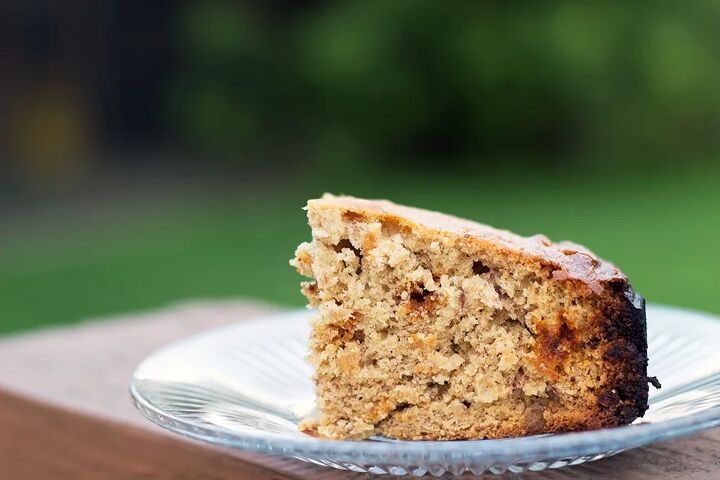 slow cooker banana bread, A slice of banana bread on a clear plate
