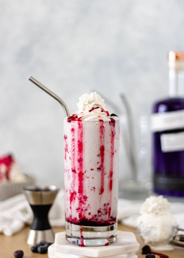 mixed berry ice cream shake, Mixed Berry Ice Cream Shake in a glass with compote running down the sides