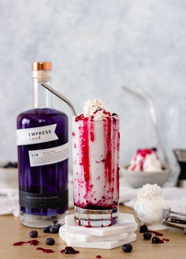 mixed berry ice cream shake, Mixed Berry Ice Cream Shake in a glass with a bottle of Empress Gin