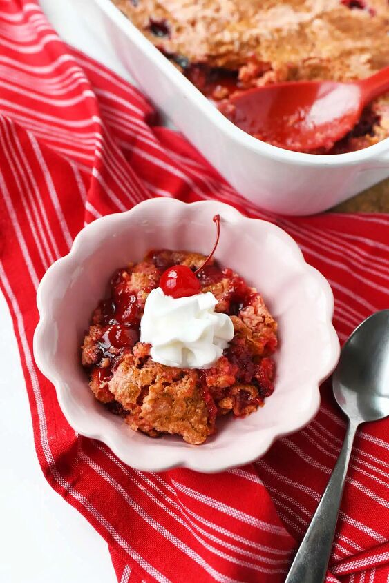 strawberry cherry dump cake, A pink bowl with strawberry cherry dump cake inside