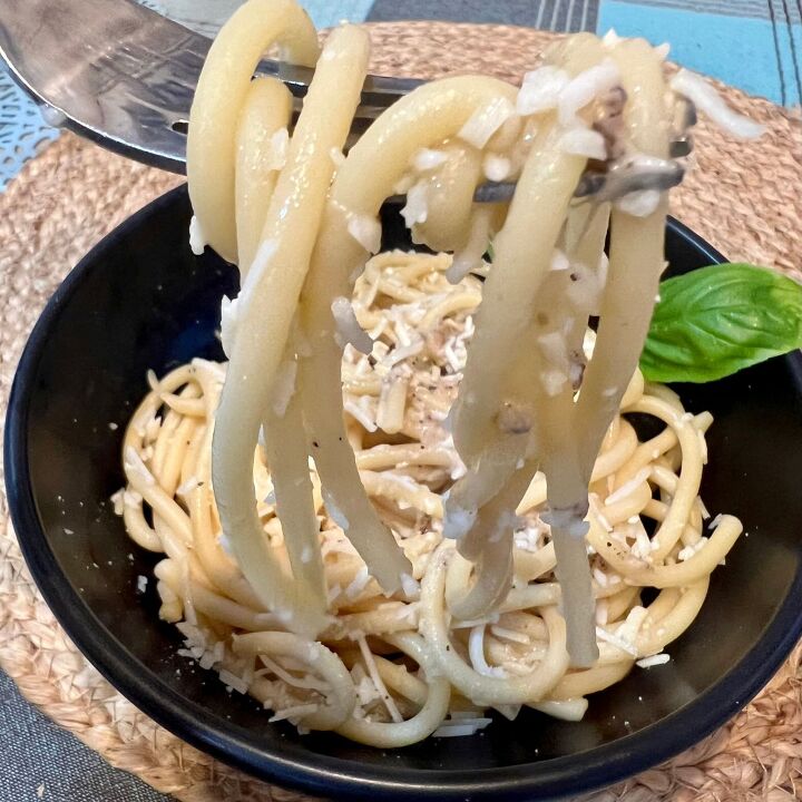healthy cacio e pepe, Bucatino Cacio E Pepe Pasta being twirled on a fork