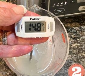 healthy cacio e pepe, A thermometer in a cup of hot pasta water measuring temperature
