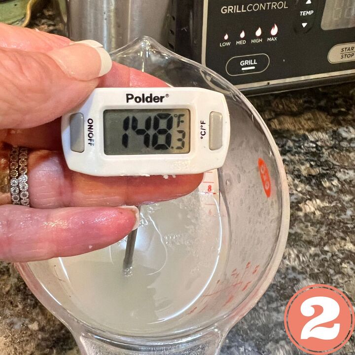 healthy cacio e pepe, A thermometer in a cup of hot pasta water measuring temperature