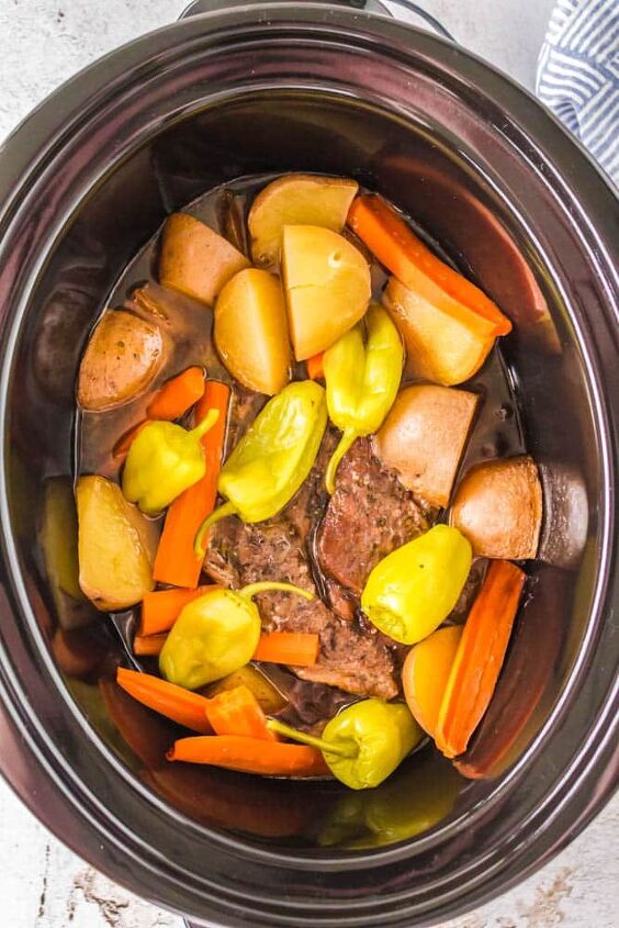mississippi pot roast with potatoes and carrots crock pot, Mississippi Pot Roast with Potatoes and Carrots in the crockpot after being cooked