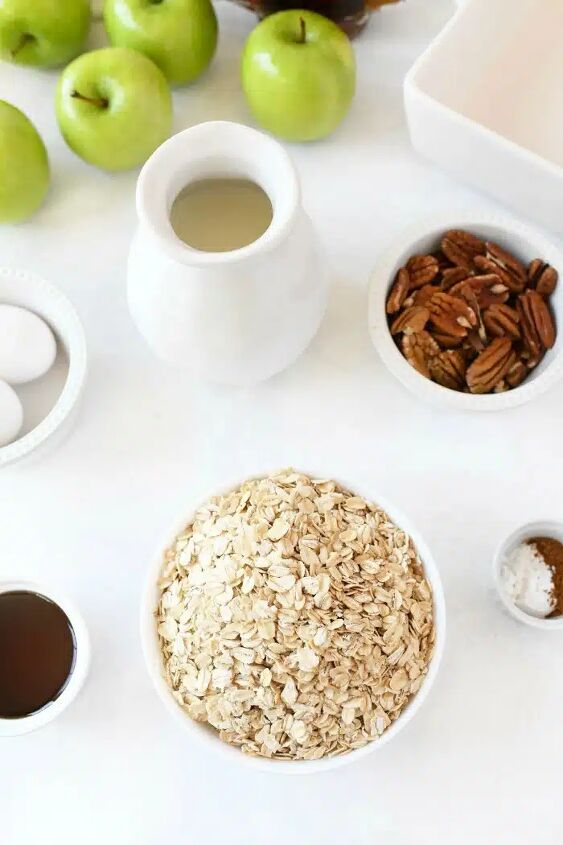 baked apple oatmeal, apple Oatmeal ingredients on a white table