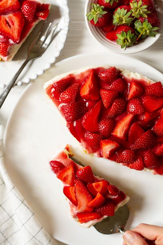 philadelphia condensed milk no bake strawberry cheesecake, No Bake Strawberry Cheesecake served on a white plate with a side of whole strawberries