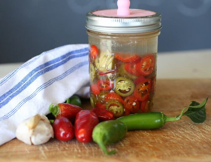 how to make fermented jalapenos probiotic rich lacto fermented food, Fermented Jalapenos are tangy and delicious just like pickled jalapenos but with the added benefits of Lacto fermentation Spice up your sandwiches or nachos with these zesty jalapenos