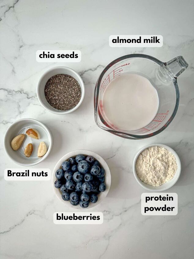 blueberry protein shake, Ingredients needed to make a blueberry protein shake include blueberries almond milk chia seeds and Brazil nuts