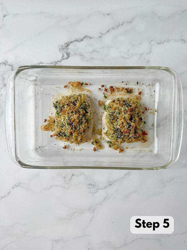 baked panko crusted cod, Two baked cod topped with a golden brown panko and parmesan crust in a baking dish