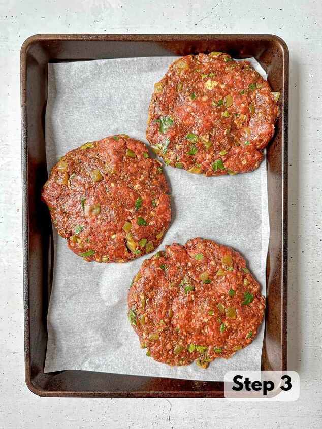 southwest burger with chipotle mayo, Three uncooked burger patties on a sheet pan lined with parchment paper