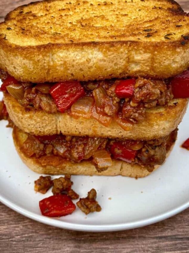 southwest burger with chipotle mayo, Sloppy joes on Texas toast stacked into a tall sandwich on a white plate