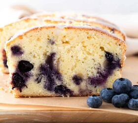 the best lemon blueberry pound cake loaf, A slice of blueberry pound cake with fresh blueberries