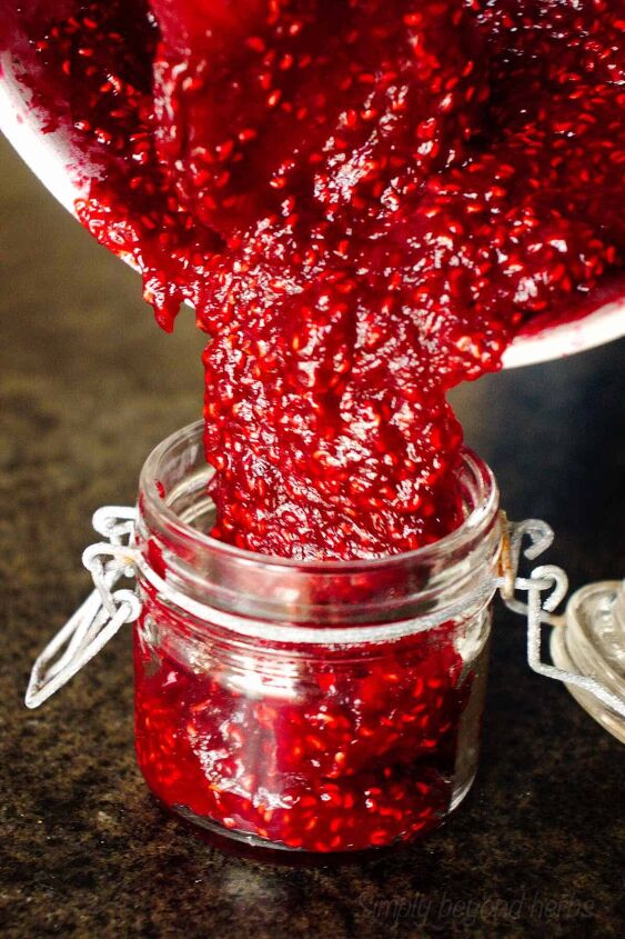 rich red raspberry preserves without pectin, ladle into a sterilized jar