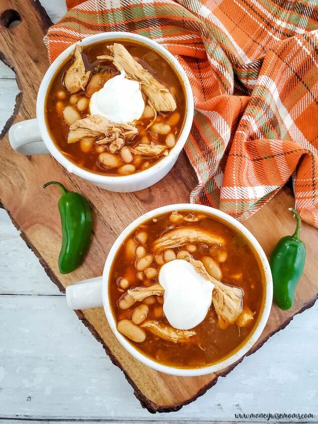 slow cooker chicken chili with white beans, top down look at finished bowls of chicken chili with white beans made in slow cooker ready to eat