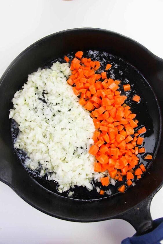 vegetarian rice pilaf, Onion and carrots in a skillet