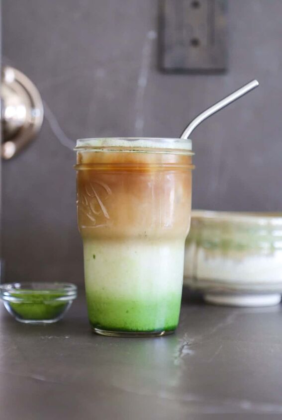 low calorie dirty matcha latte starbucks copycat, dirty matcha latte in a glass with a straw