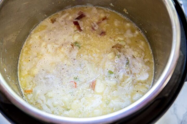 instant pot low carb cauliflower soup recipe with bacon and cheese, heavy cream and chicken stock added