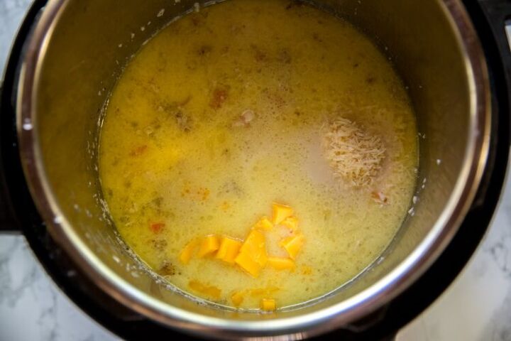 instant pot low carb cauliflower soup recipe with bacon and cheese, cheese added