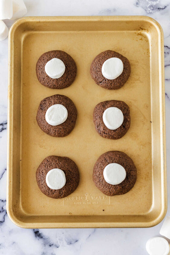 hot chocolate cookies, Putting marshmallow halves on partially baked chocolate cookie dough