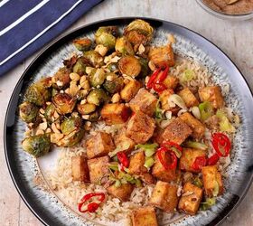 crispy salt and pepper tofu air fryer or baked, Salt and pepper tofu over rice with Brussels sprouts on plate
