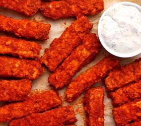 crispy salt and pepper tofu air fryer or baked, Strips of Buffalo tofu on a plate with a small dish of ranch dressing