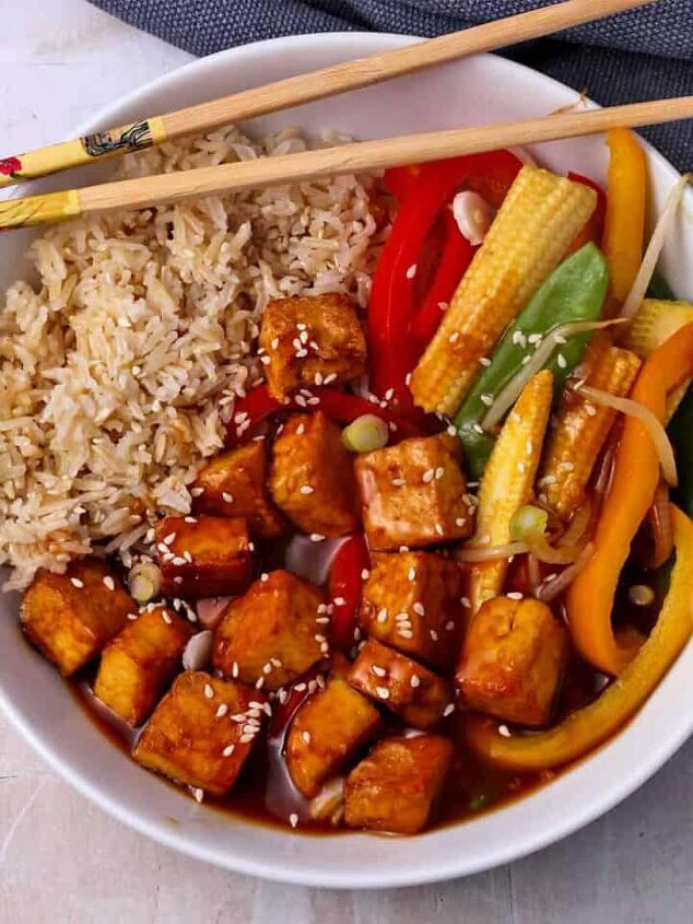 crispy salt and pepper tofu air fryer or baked, A bowl of sweet and sour tofu with rice and vegetables