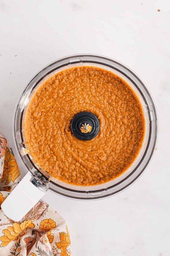 southern sweet potato pie recipe, Sweet potato pie filling in a food processor after blending together on a white counter
