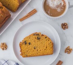 moist pumpkin bread, A piece of pumpkin loaf on a white plate with cinnamon sticks and a mug of coffee on the side