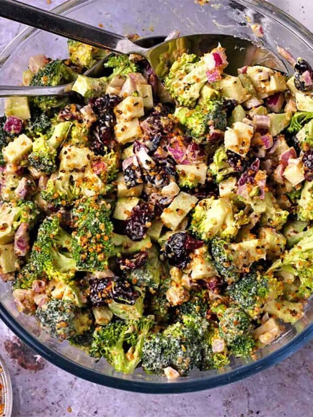lentil pomegranate salad with tahini dressing, Overhead of broccoli salad with vegan bacon bits cranberries and dressing