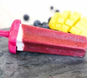 homemade cherry popsicles recipe gluten free vegan, one cherry popsicle with mangos and blueberries in the background