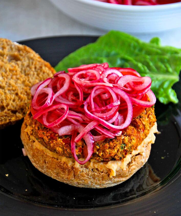 quick pickled red onions no cook recipe, Quick pickled red onions on top of a veggie burger