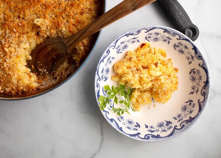 baked buttermilk mac n cheese, Wooden spoon in the baking dish and a bowl of Baked Buttermilk Mac n Cheese