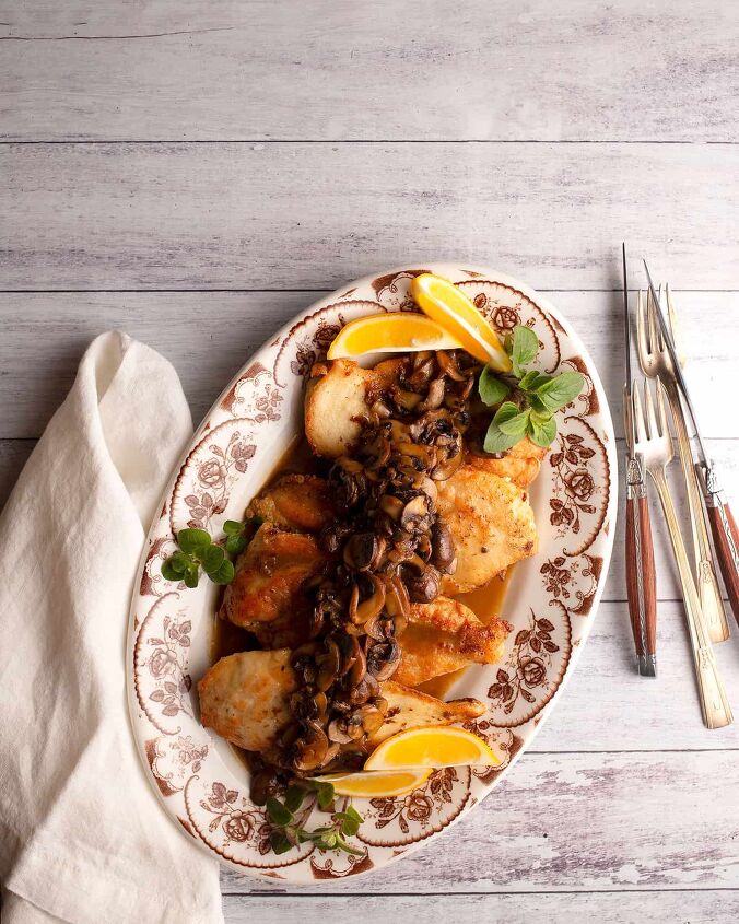 classic chicken marsala, Classic Chicken Marsala on a vintage platter with lemon and oregano