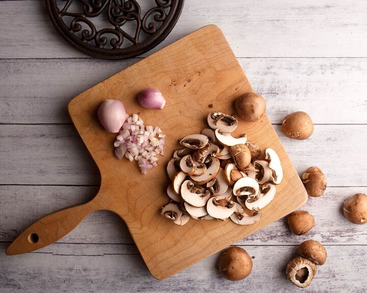 classic chicken marsala, Mushrooms and shallots on a cutting board