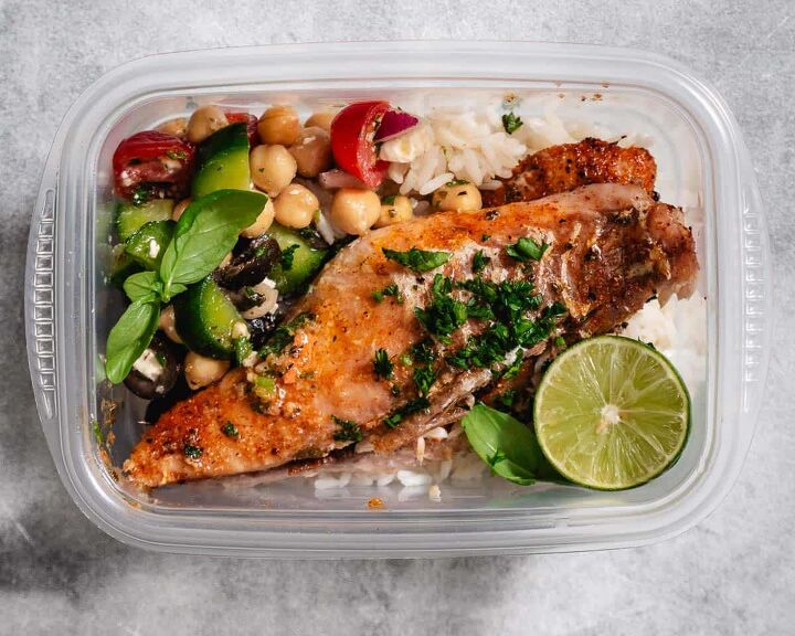 oven baked snapper with key lime butter sauce, Snapper with rice and vegetables in a container