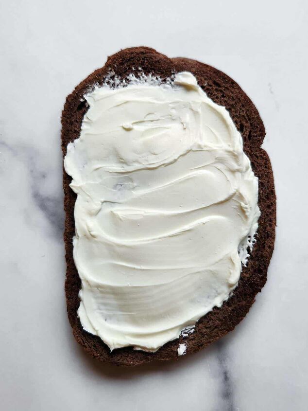 cream cheese avocado toast, Pumpernickel bread with cream cheese on a white background